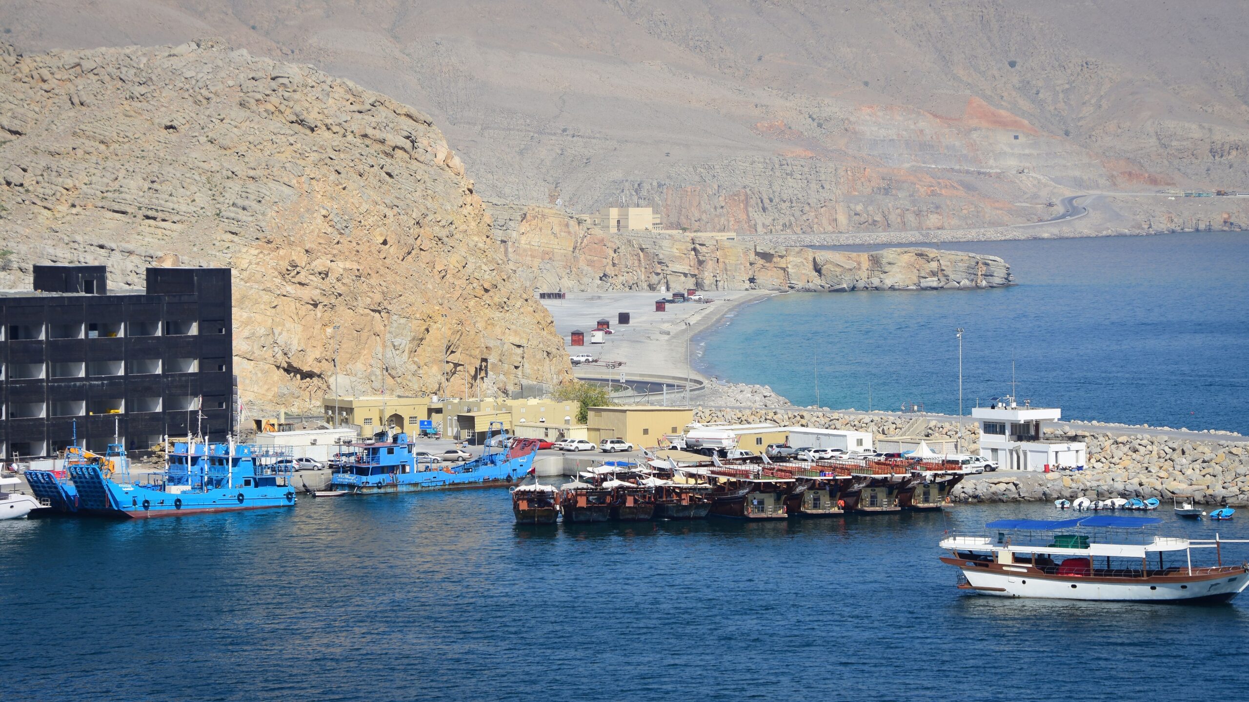 Stunning view of boats docked at Al-Chasab harbor in Musandam, Oman.